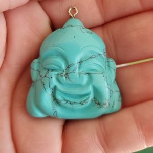 New Carved Cyan Buddha Head Pendant.